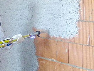 تطبيق جص جبسي باستخدام مسدس رش تطبيق جص جبسي باستخدام مسدس رش