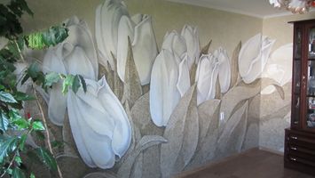 Um padrão complexo criado usando papel de parede líquido multicolorido Um padrão complexo criado usando papel de parede líquido multicolorido