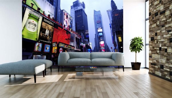 Aşağıdan gökdelenleri gören görüntü, New York'un merkezinde bir caddenin ortasında olduğunuz izlenimini veriyor