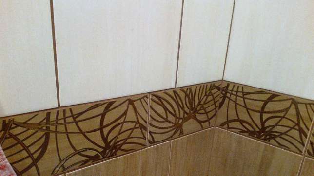 Making a choice of tiles on the wall